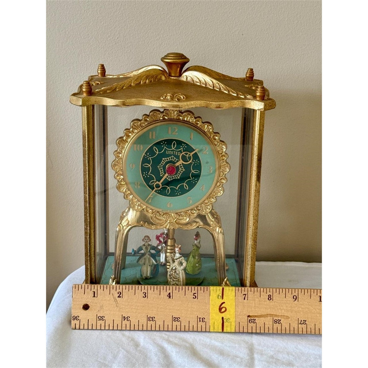 Vintage United Model 990 Brass Clock w/ Dancing Figurines & Glass Case Works