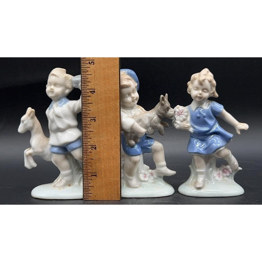 3 Vintage German Hand-Painted Ceramic Children Figurines 3.5×1×4.75″ Set