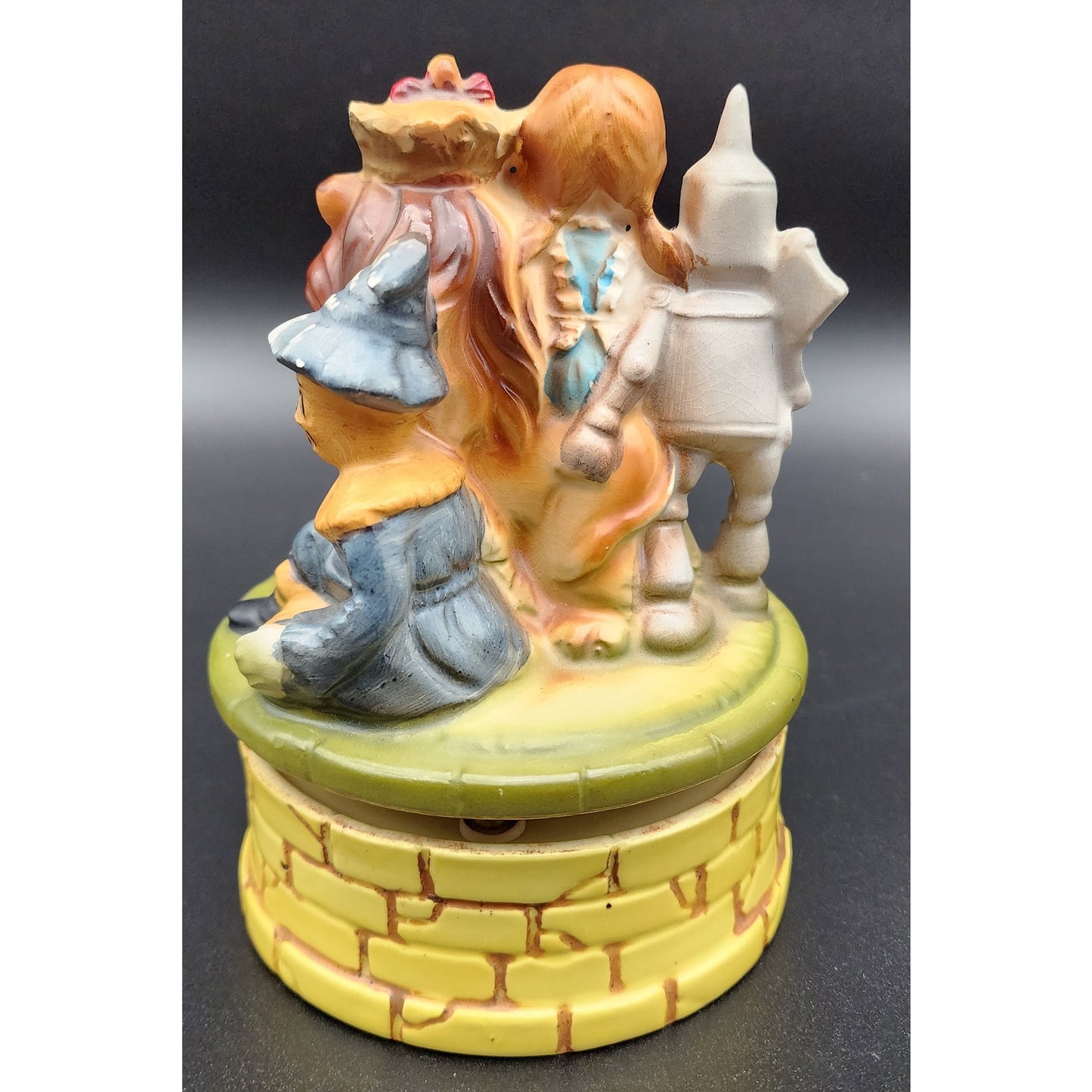 Vintage Japan Wizard of Oz Ceramic Music Box Rotating Figurine Dorothy & Lion