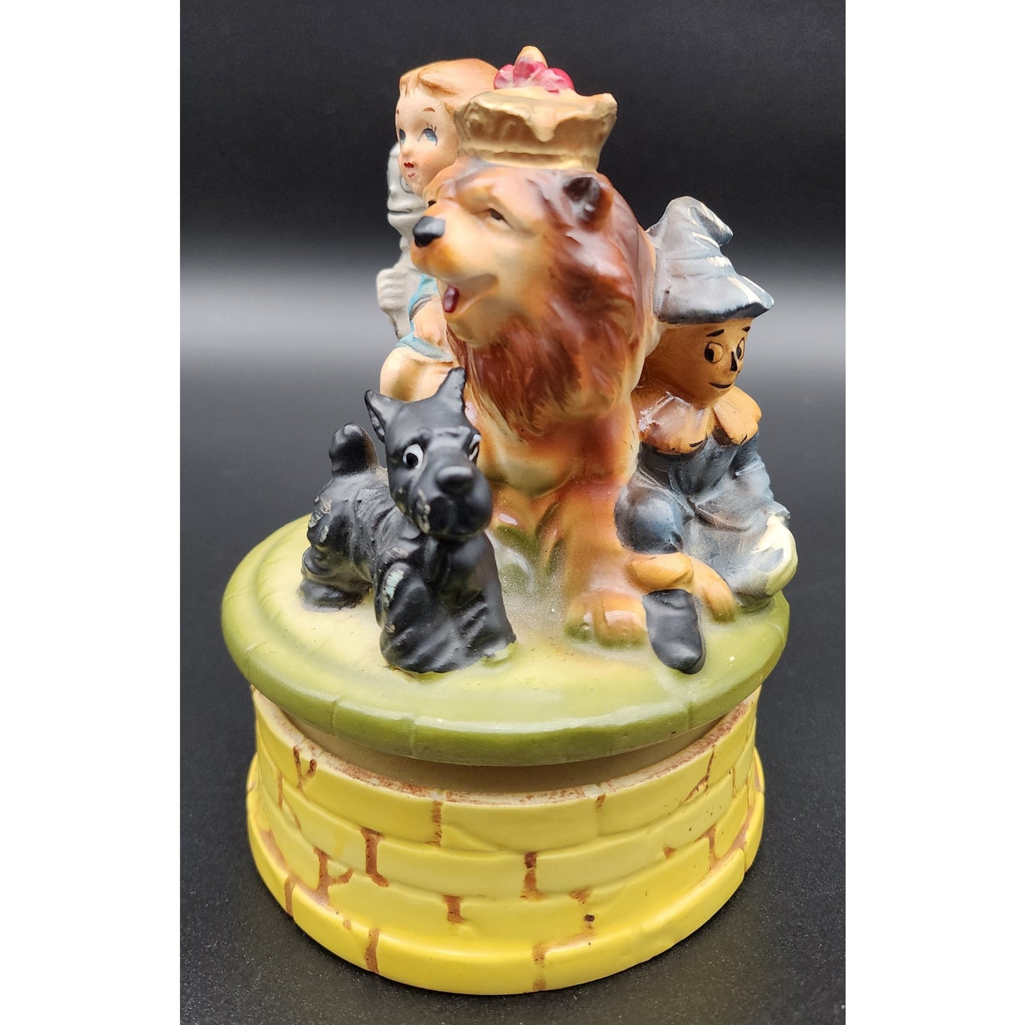 Vintage Japan Wizard of Oz Ceramic Music Box Rotating Figurine Dorothy & Lion