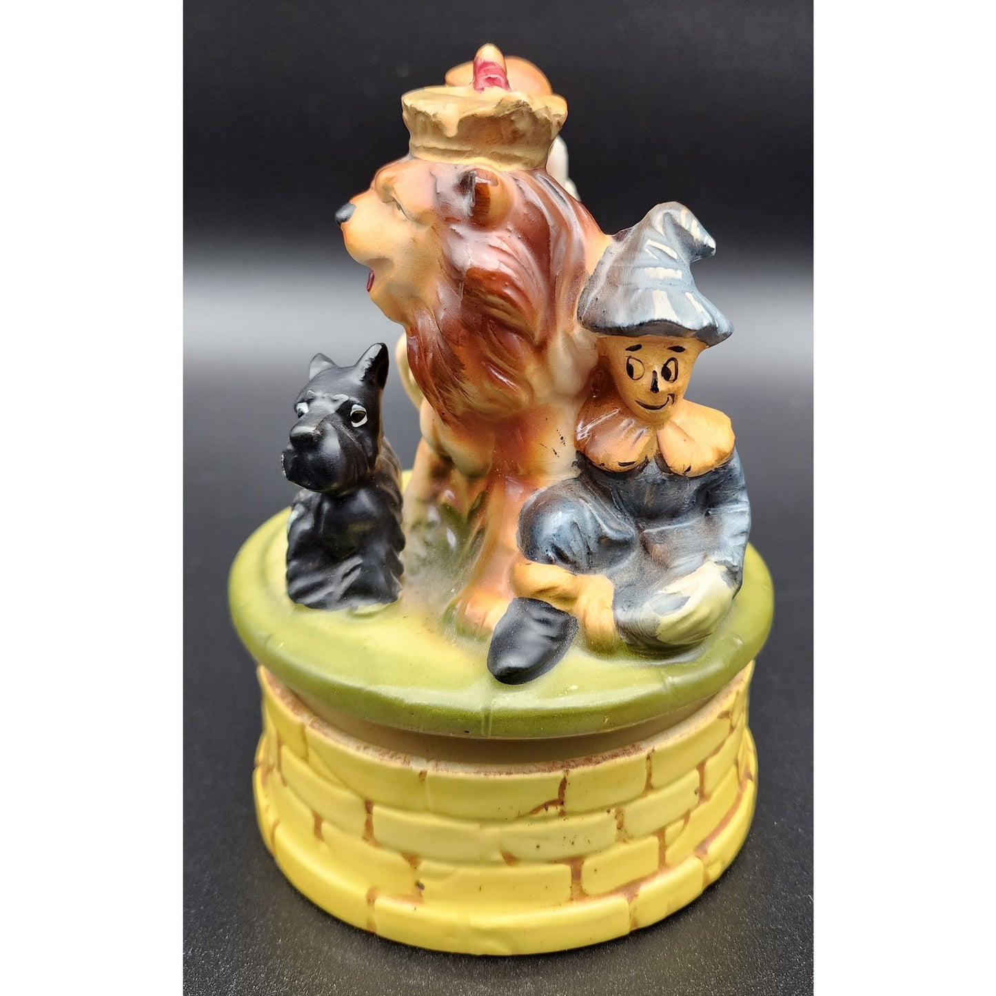 Vintage Japan Wizard of Oz Ceramic Music Box Rotating Figurine Dorothy & Lion