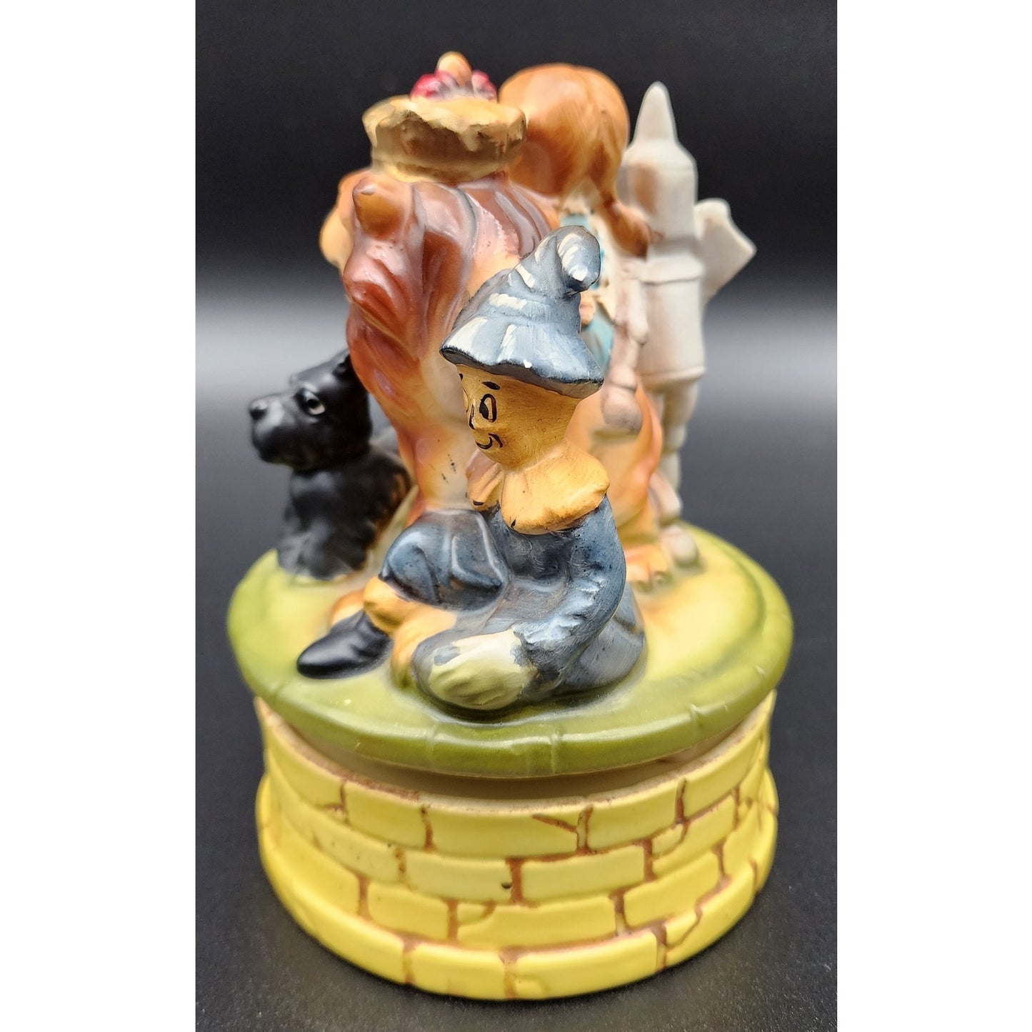 Vintage Japan Wizard of Oz Ceramic Music Box Rotating Figurine Dorothy & Lion