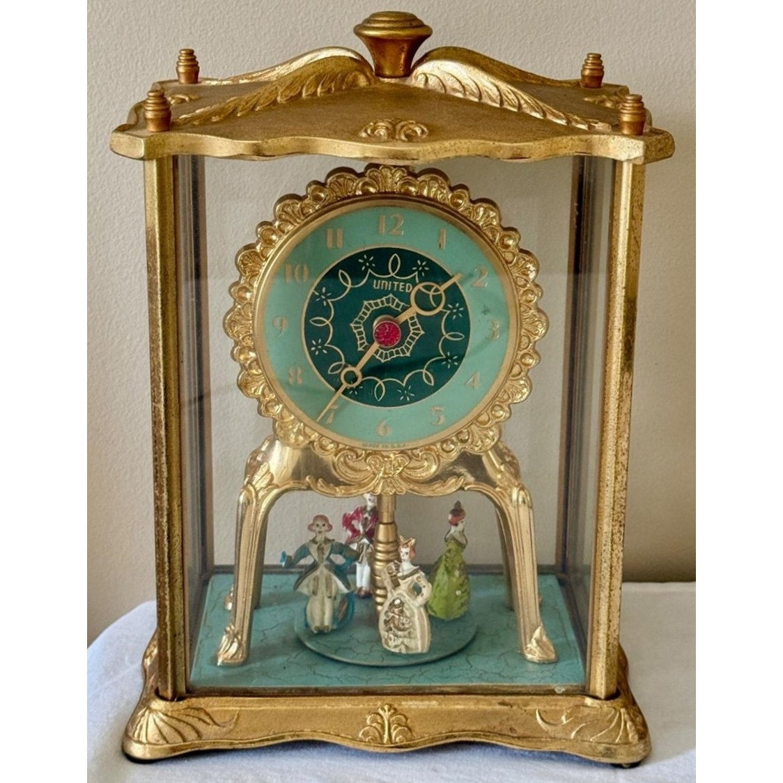 Vintage United Model 990 Brass Clock w/ Dancing Figurines & Glass Case Works