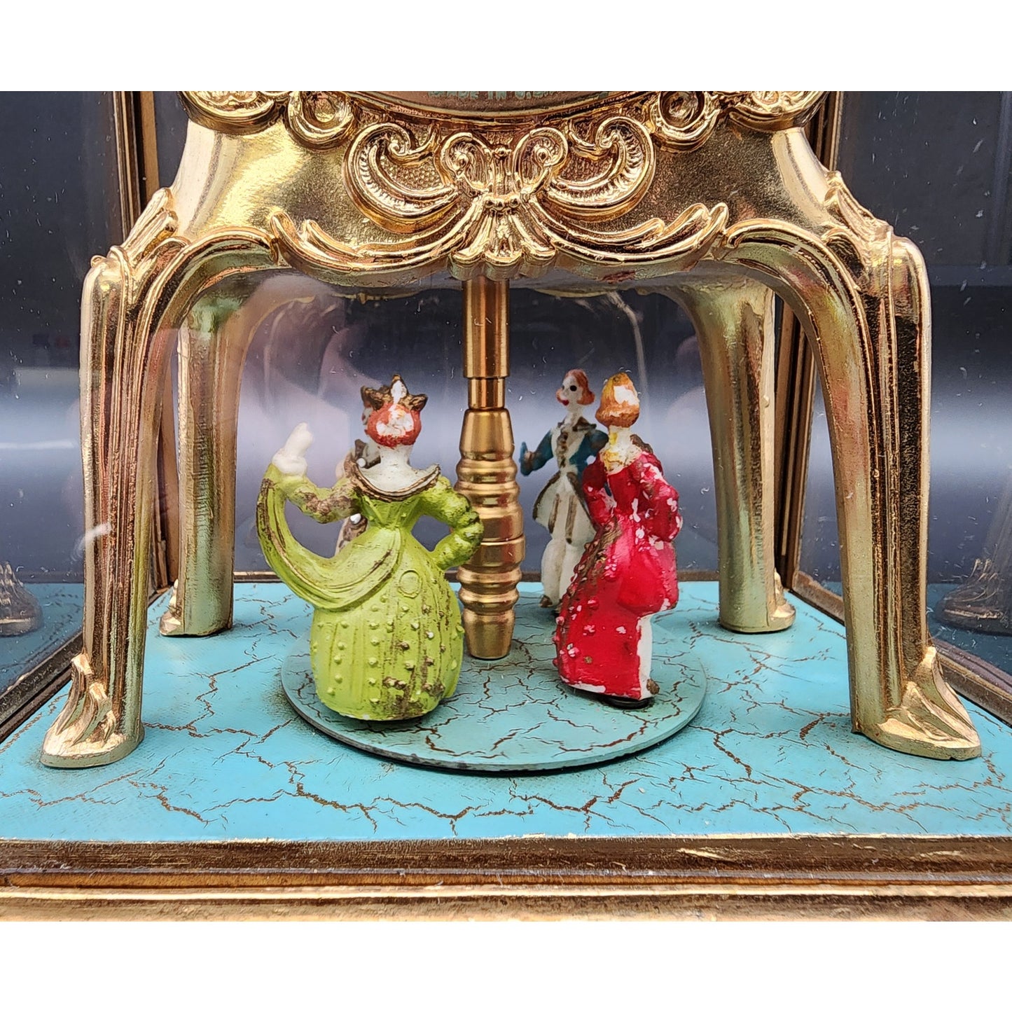Vintage United Model 990 Brass Clock w/ Dancing Figurines & Glass Case Works