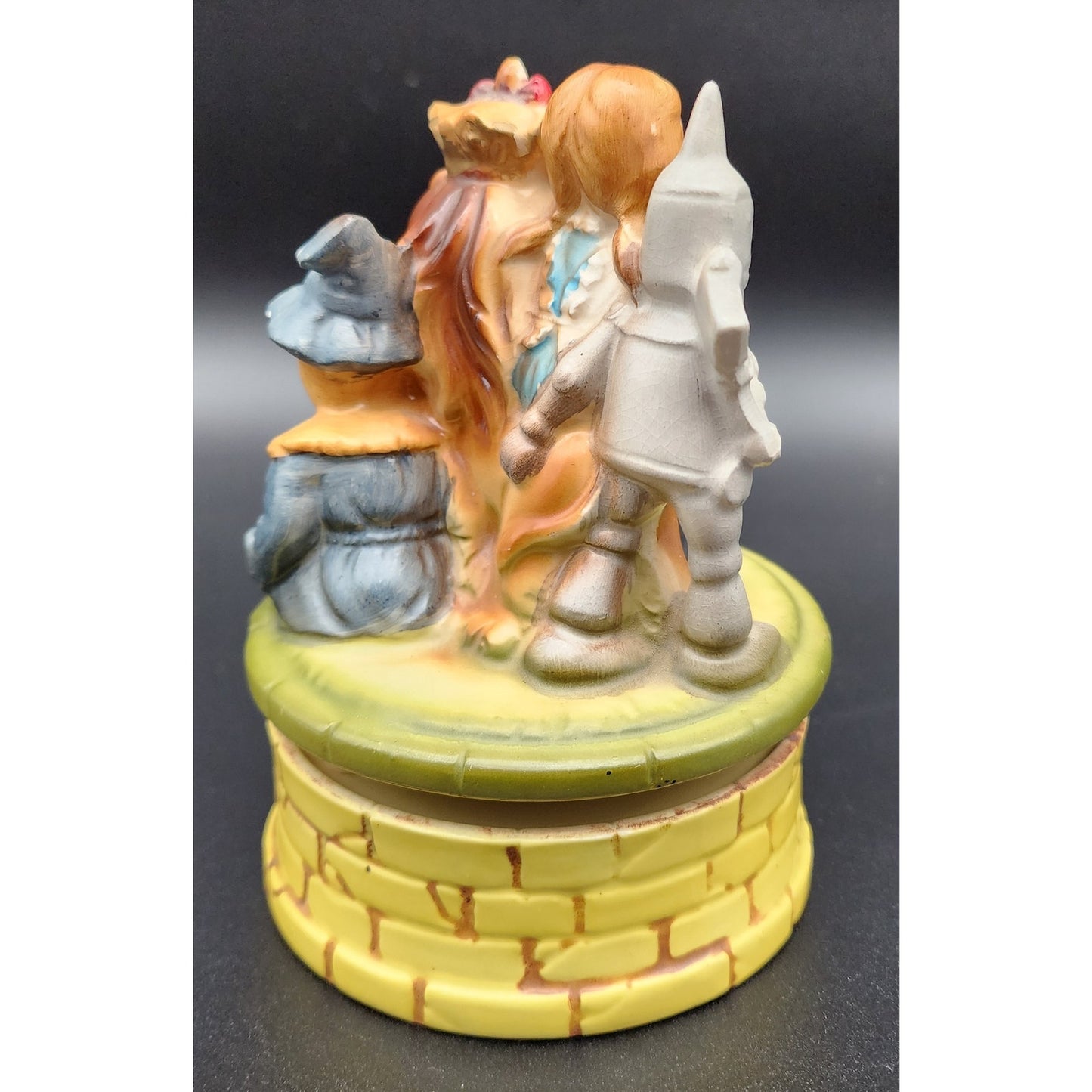 Vintage Japan Wizard of Oz Ceramic Music Box Rotating Figurine Dorothy & Lion