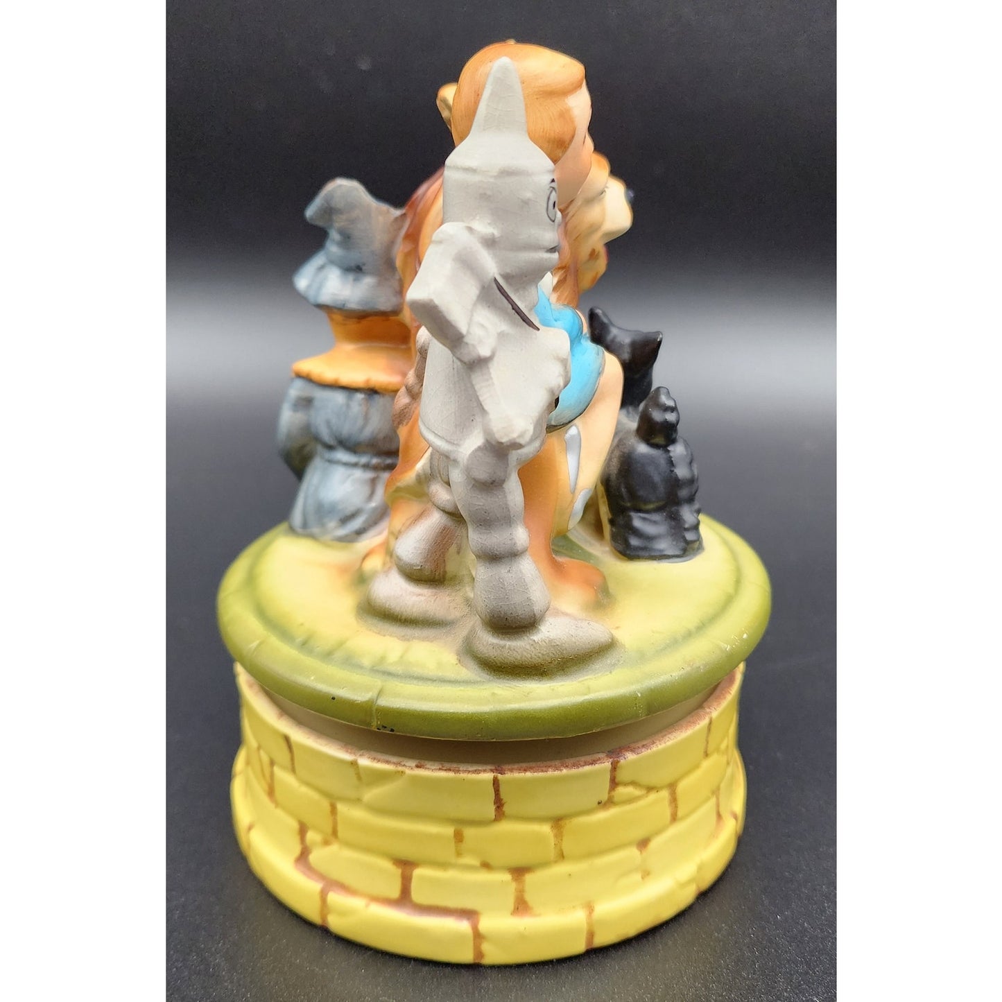 Vintage Japan Wizard of Oz Ceramic Music Box Rotating Figurine Dorothy & Lion